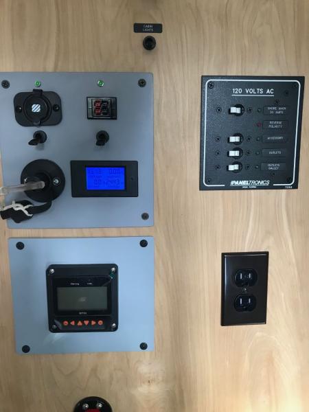 Updated Electrical Panel - Updated system included adding two 100AH LiFePO4 batteries.  Also switched to Epever 30-amp charge controller with MP50 remote.  Updates included an energy management system monitor.