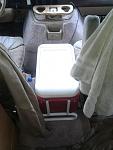 We use ice chest between front seat for bread n chips,potatos etc...If fridge ever poops out we can use ice n move stuff from fridge to chest n vice...